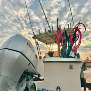 The boat with a variety of spearguns, ready to go