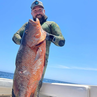 Tony and a well-deserved snapper on a charter